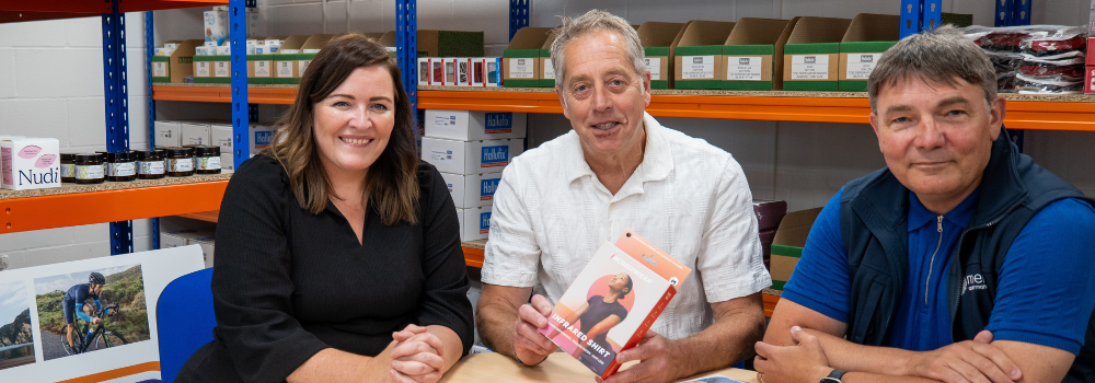 Image of Julie Cuthbertson, with the owners of Brace-Yourself